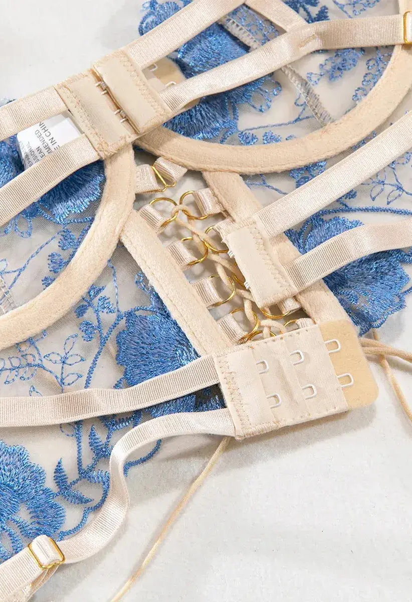 Blue bustier top lingerie with back lacing and gold chain details, adjustable for perfect fit