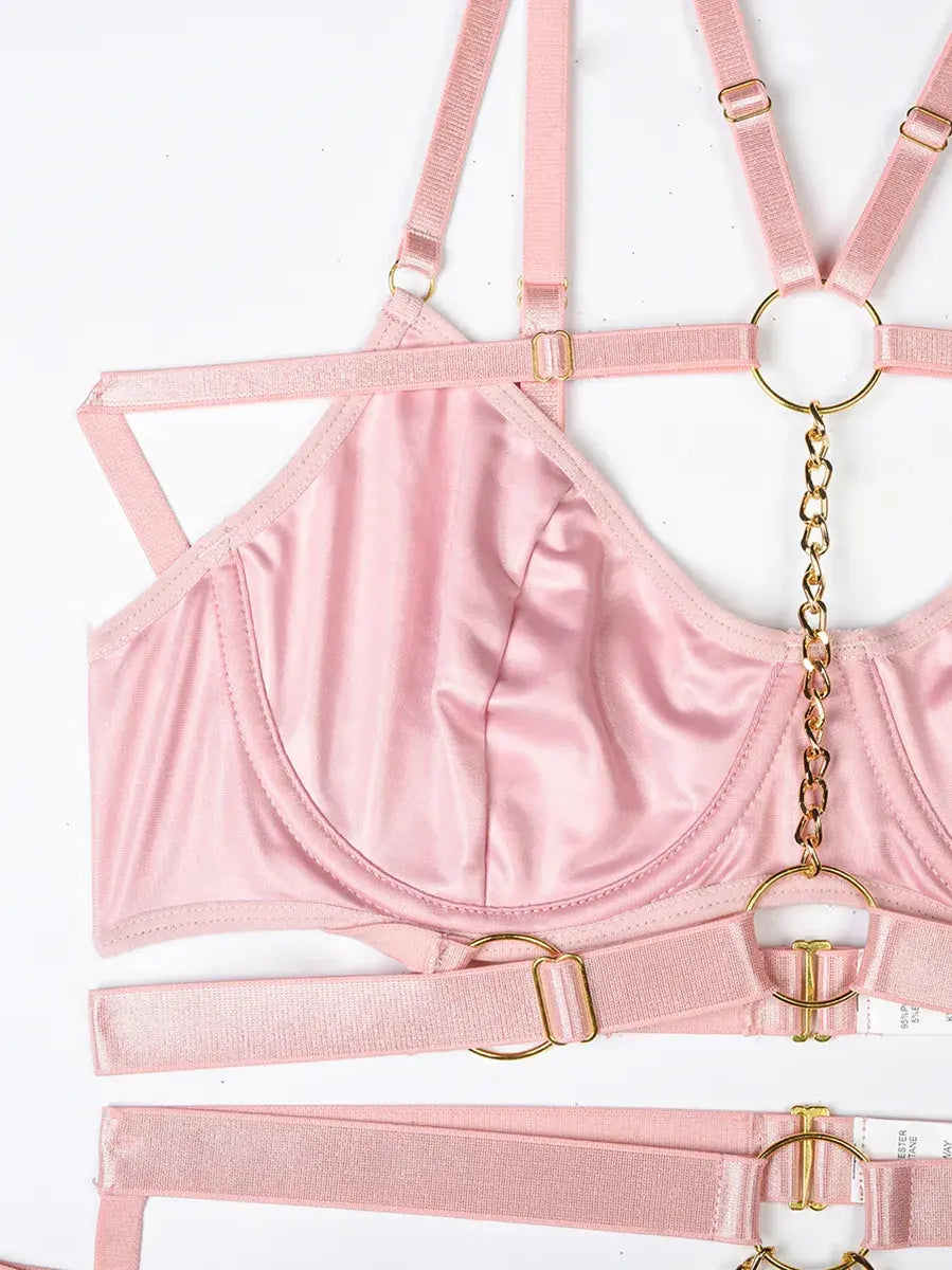 Close-up of pink PU leather construction with fine seams and craftsmanship in the Blush Bond lingerie set.