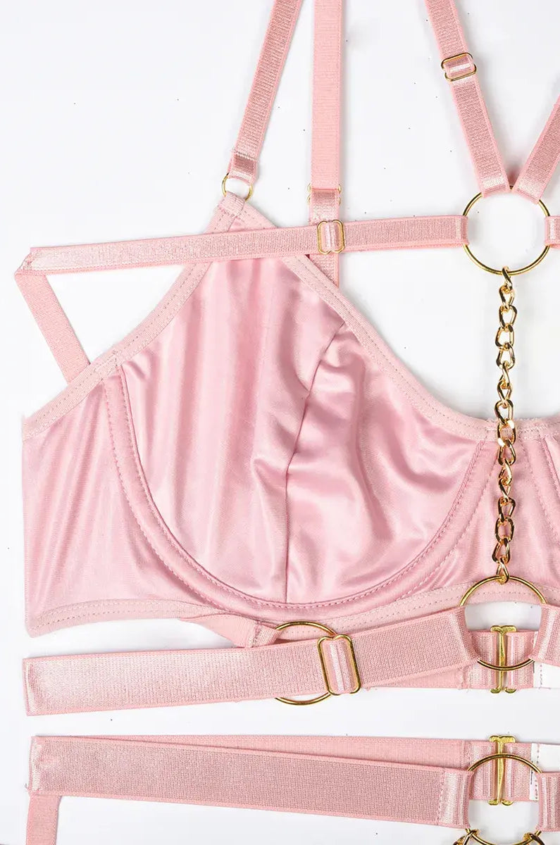 Close-up of pink PU leather construction with fine seams and craftsmanship in the Blush Bond lingerie set.