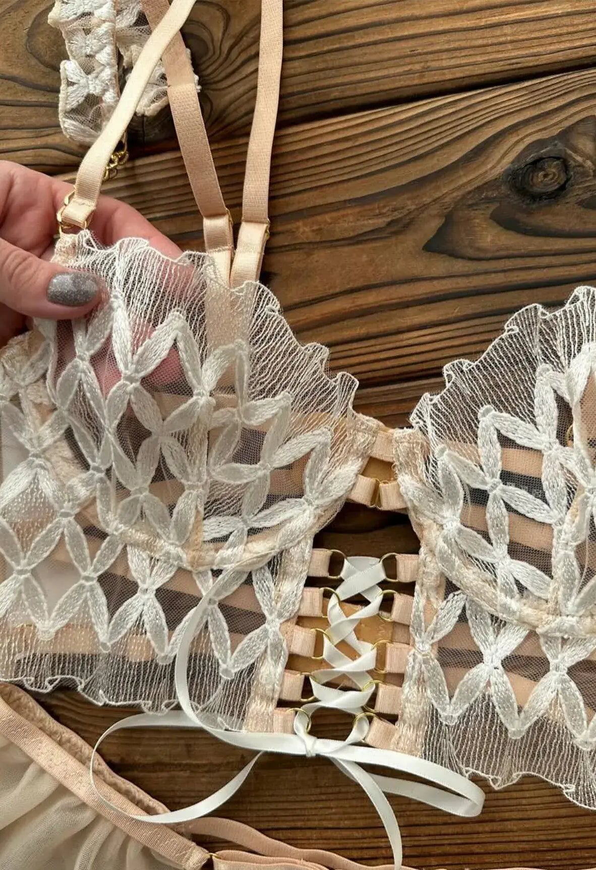 Champagne Mirage light gold lace corset close-up detail, highlighting exquisite embroidery textures.