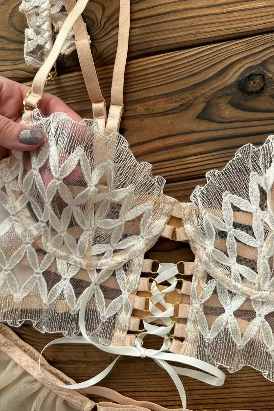 Champagne Mirage light gold lace corset close-up detail, highlighting exquisite embroidery textures.