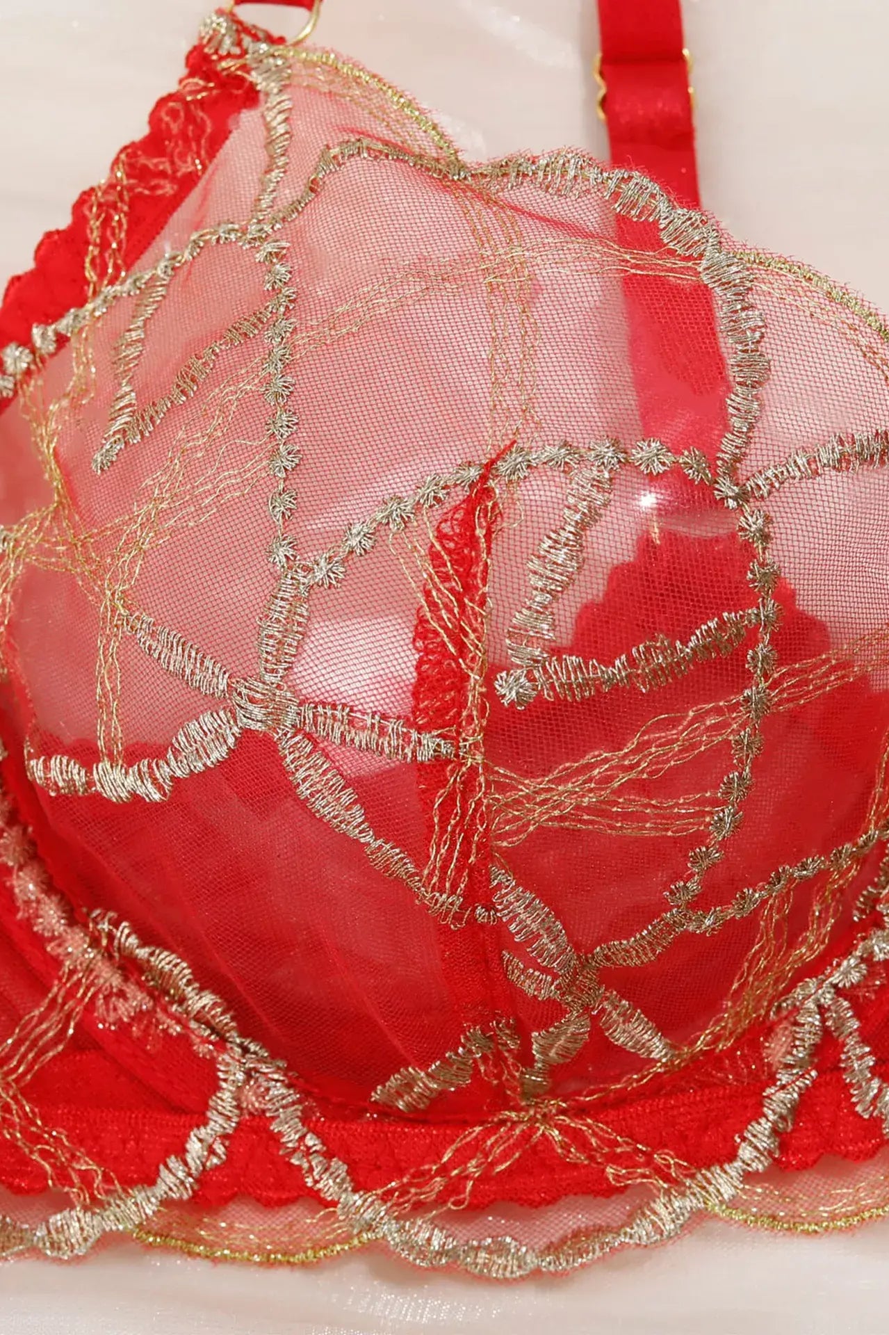 Close-up of Crimson Flame red embroidery thread highlighting refined craftsmanship.