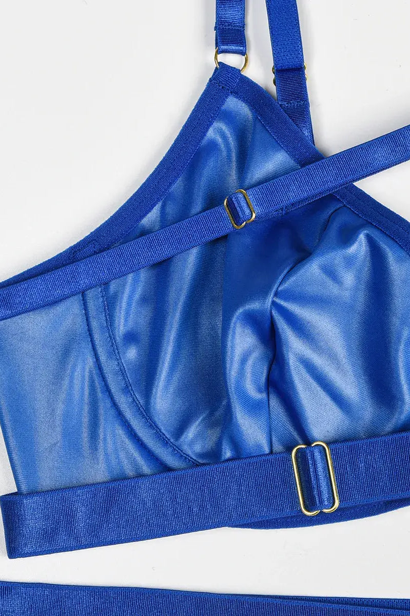 Detailed shot of blue PU leather showcasing clean seams and refined craftsmanship from the Electric Mirage set.