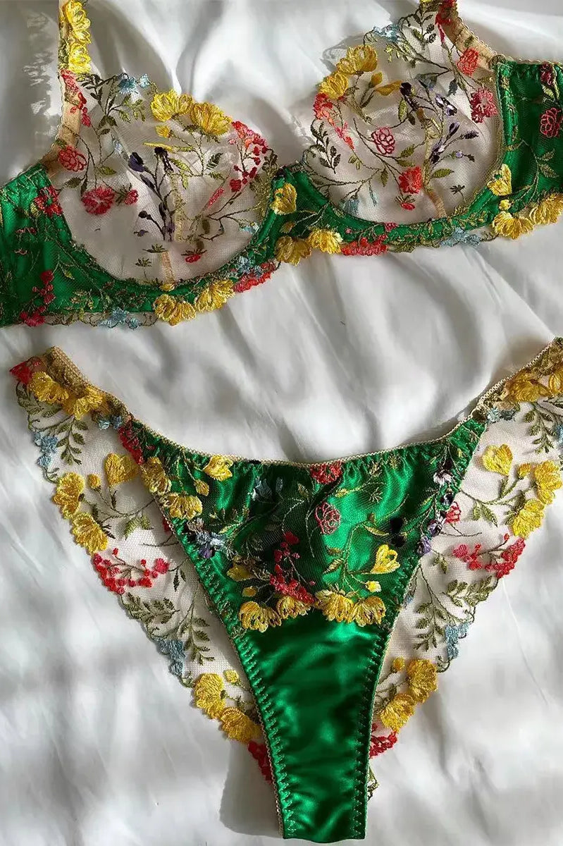 Green bra and satin shorts lingerie set, flatlay display showing embroidery detail