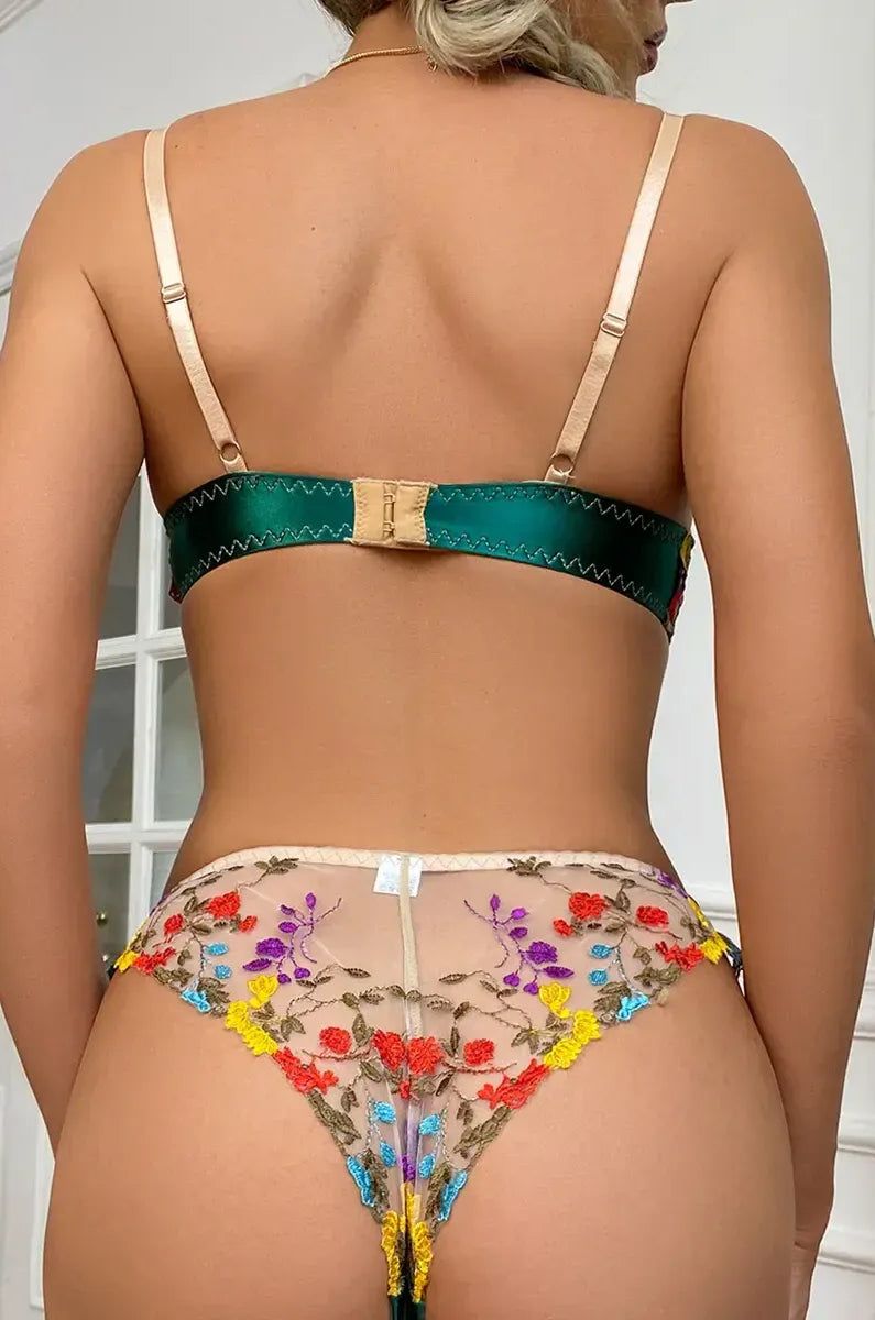 Green floral lace bra with adjustable back straps and clasp detail