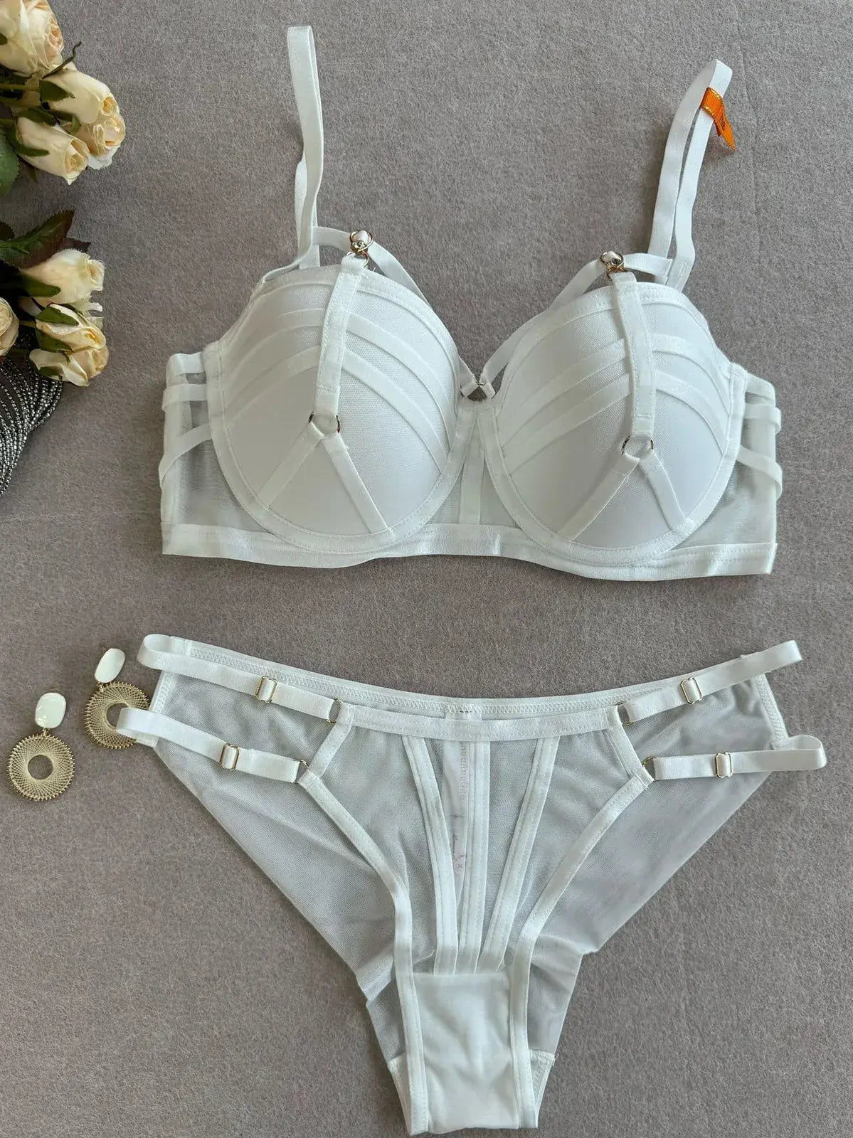 Full outline of Ivory Halo white bra and thong set with structured design