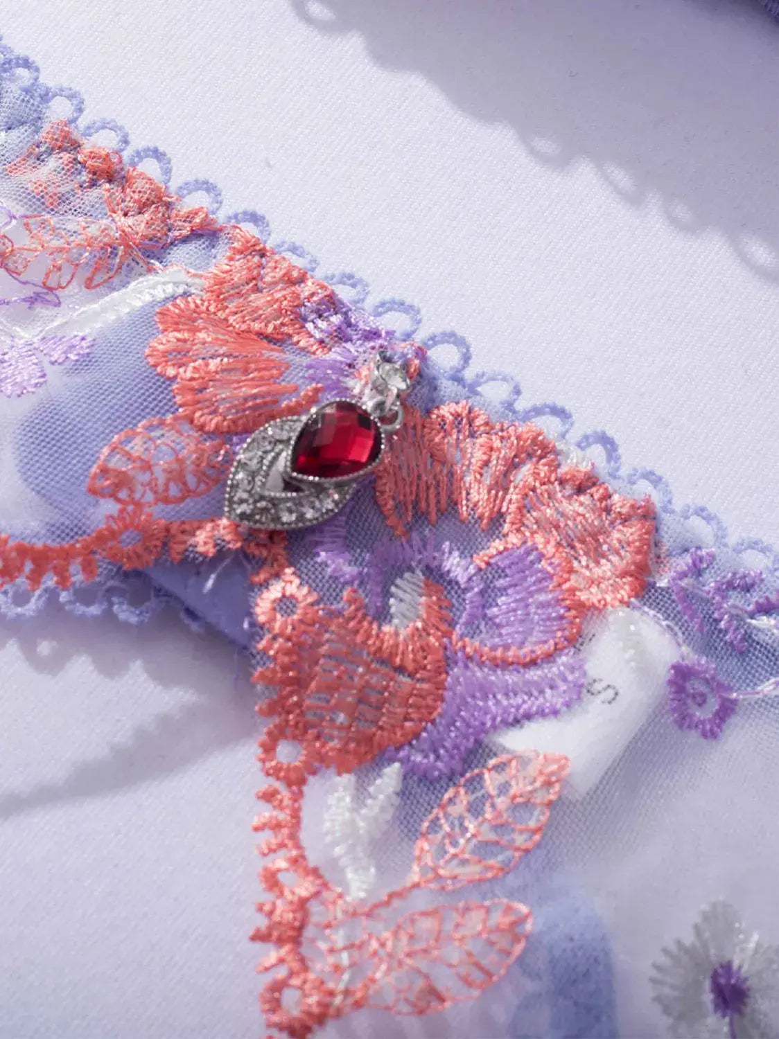 Lavender Bloom lingerie lace waist panel with embroidery and sheer detailing.