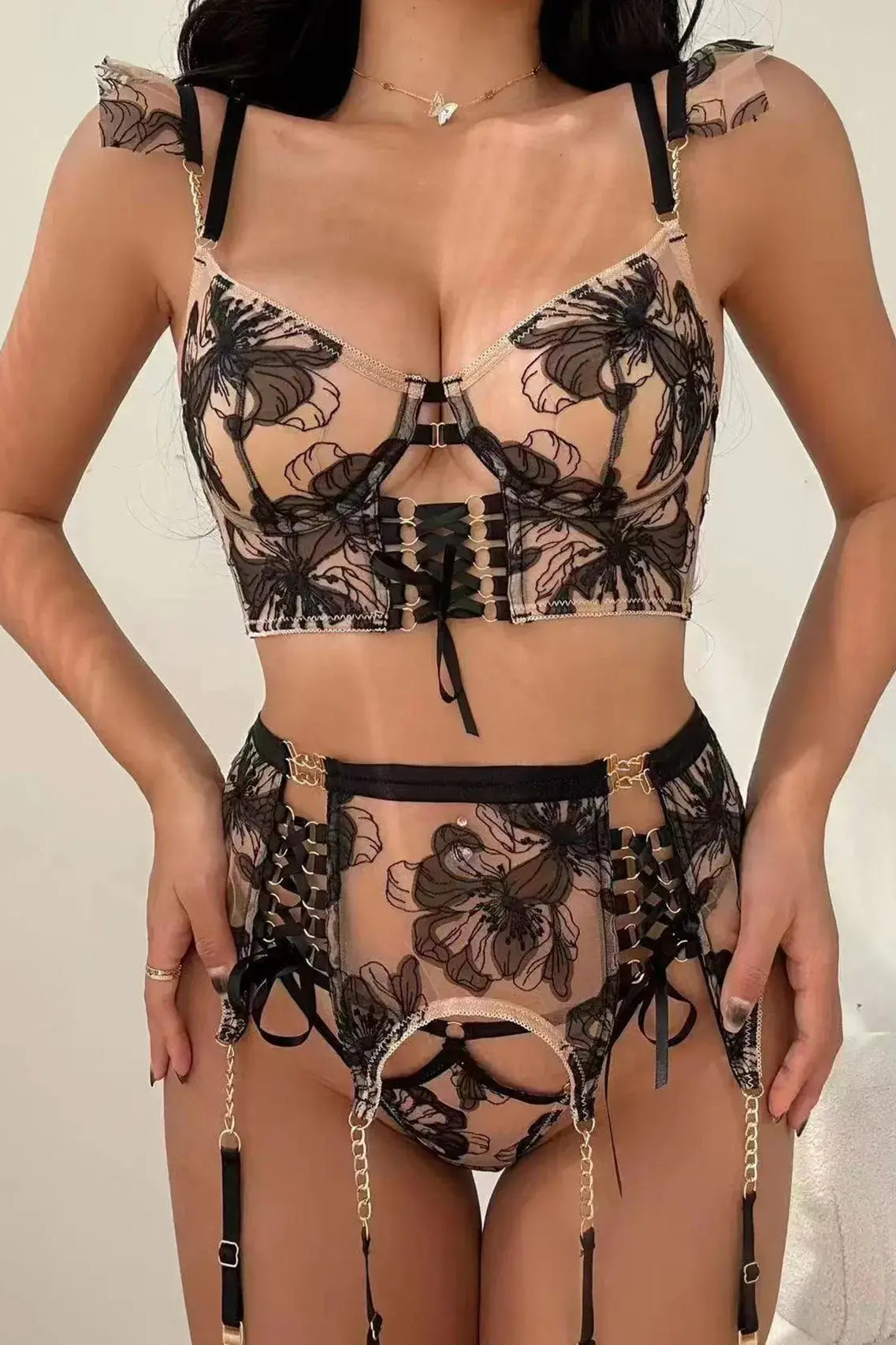 Noir Eclipse 3-Piece Black Mesh Corset Lingerie Set front view showcasing waist-cinching design with sheer mesh and gold embroidery