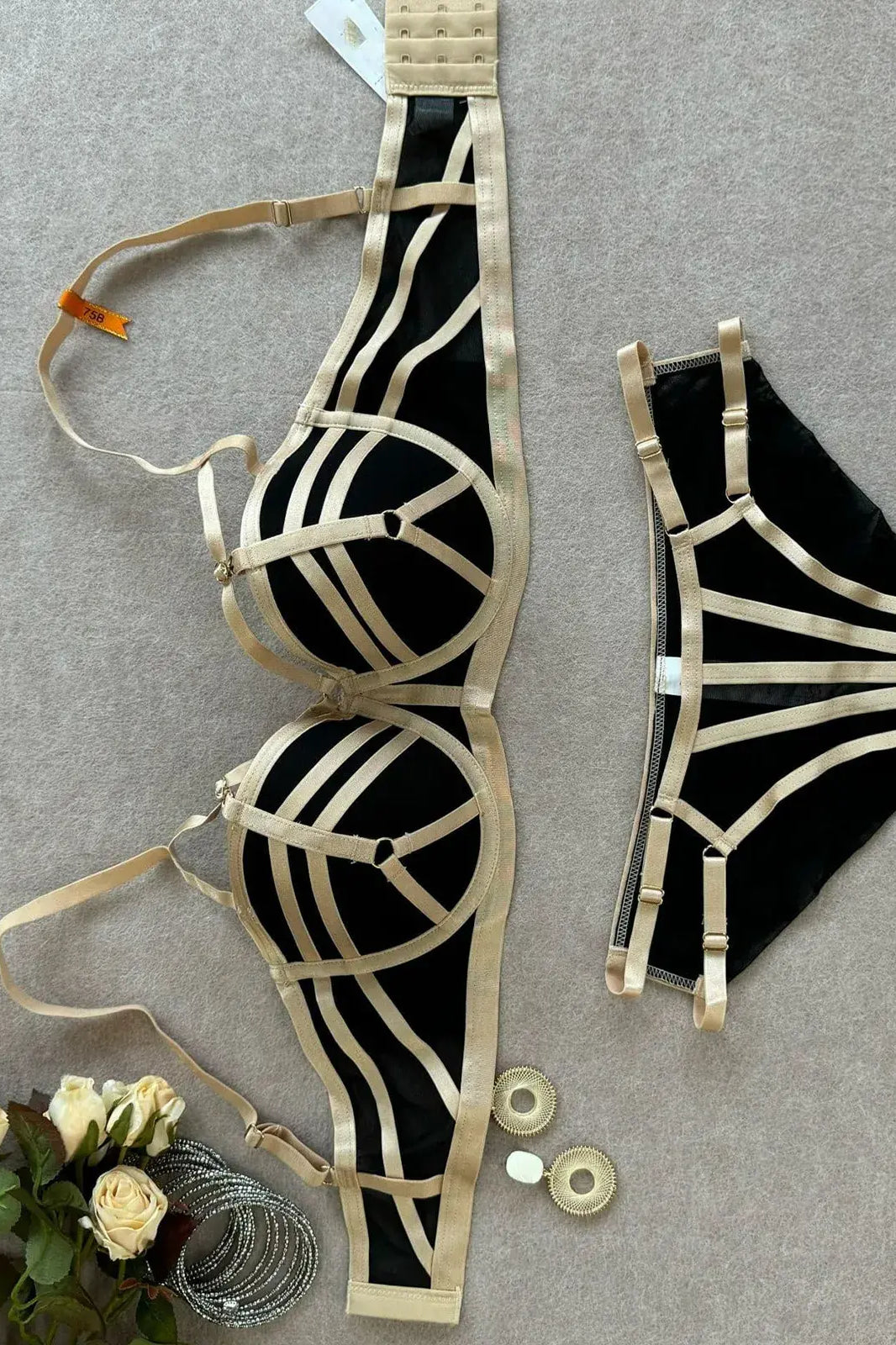 Nude strap bra laid flat showcasing refined luxury texture