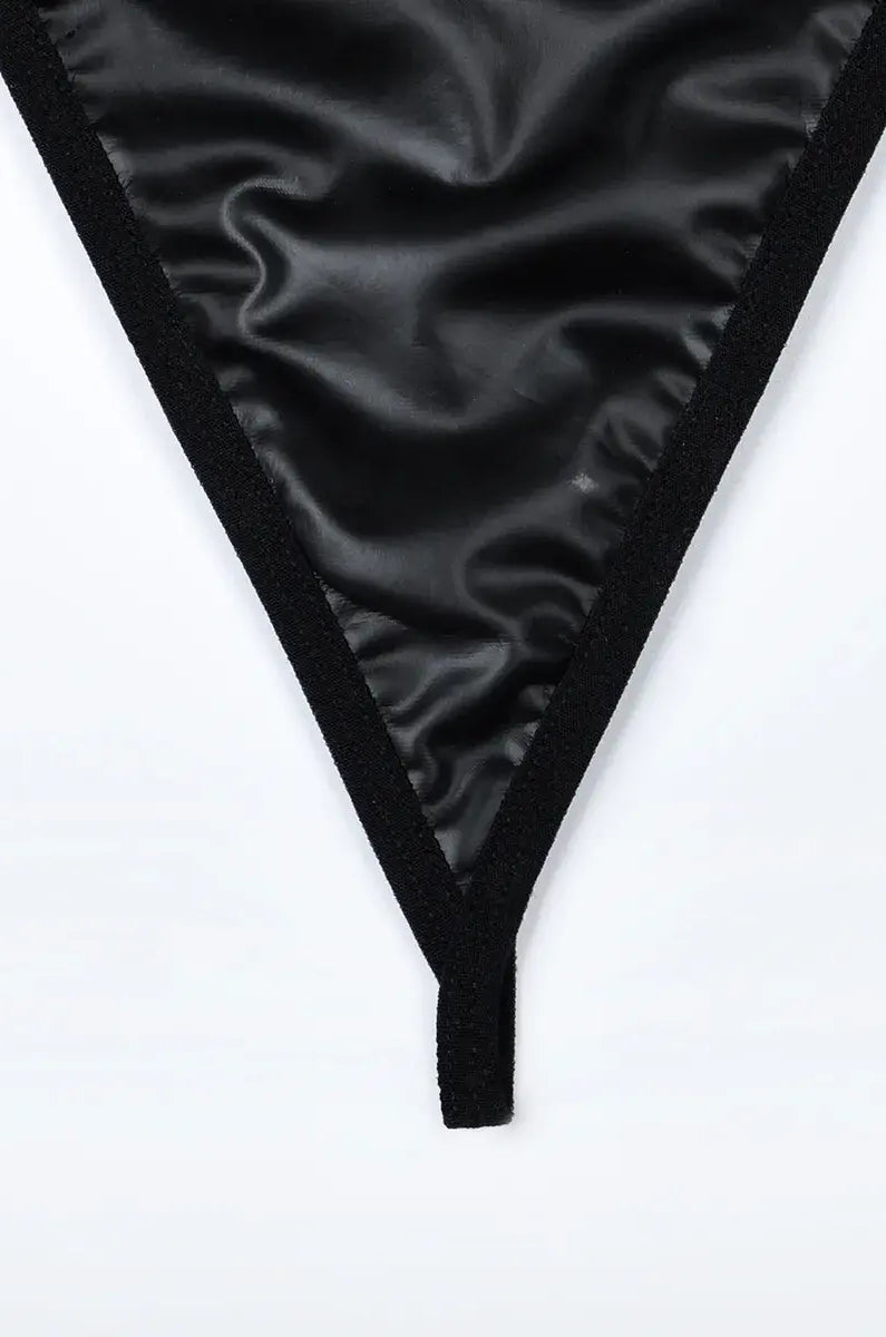 Comfortable black PU thong with soft lining and flattering fit, designed for both elegance and wearability in the Obsidian Edge set.