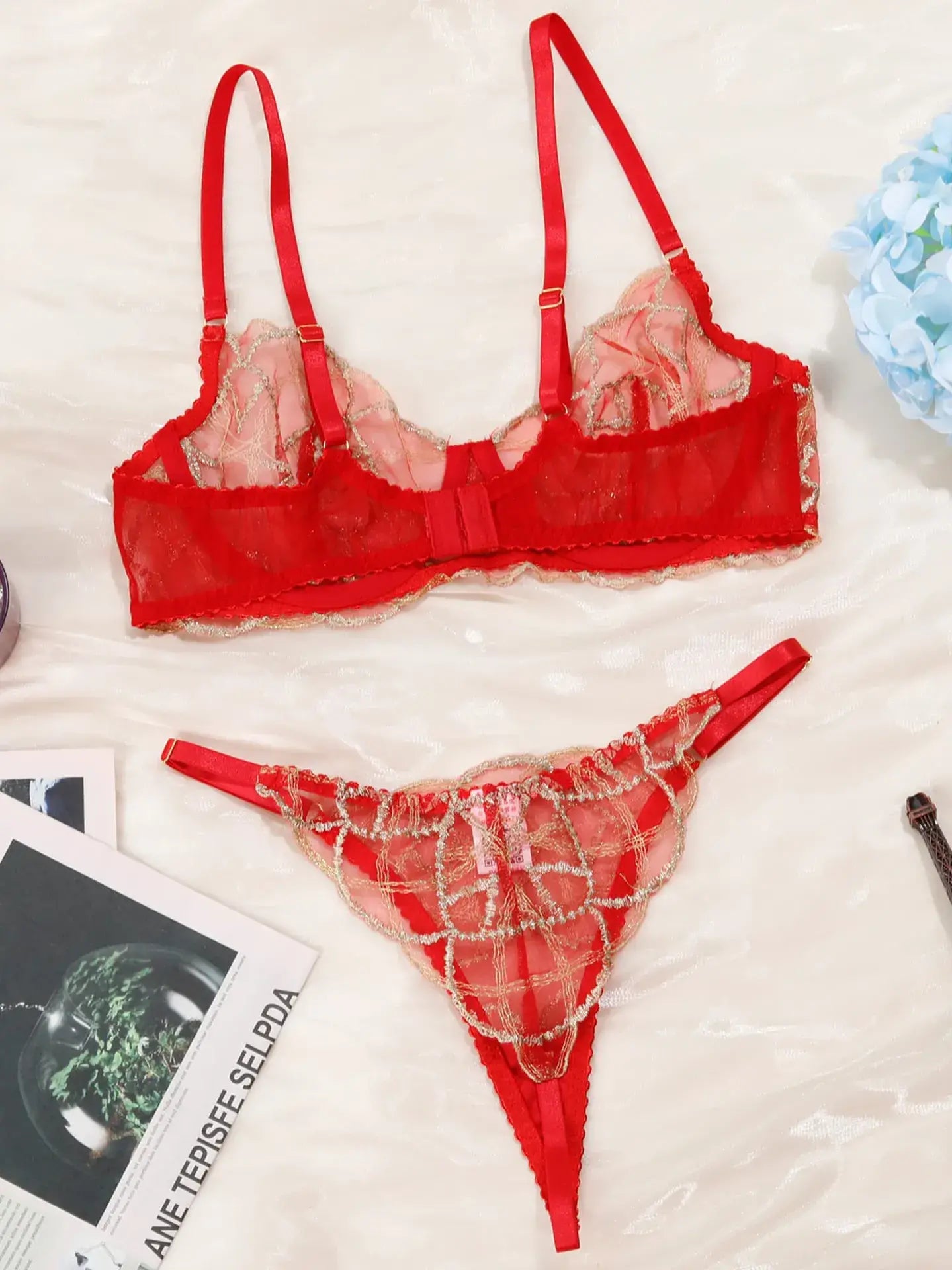 Full view of scarlet lace lingerie showing fabric distribution and balanced proportions.