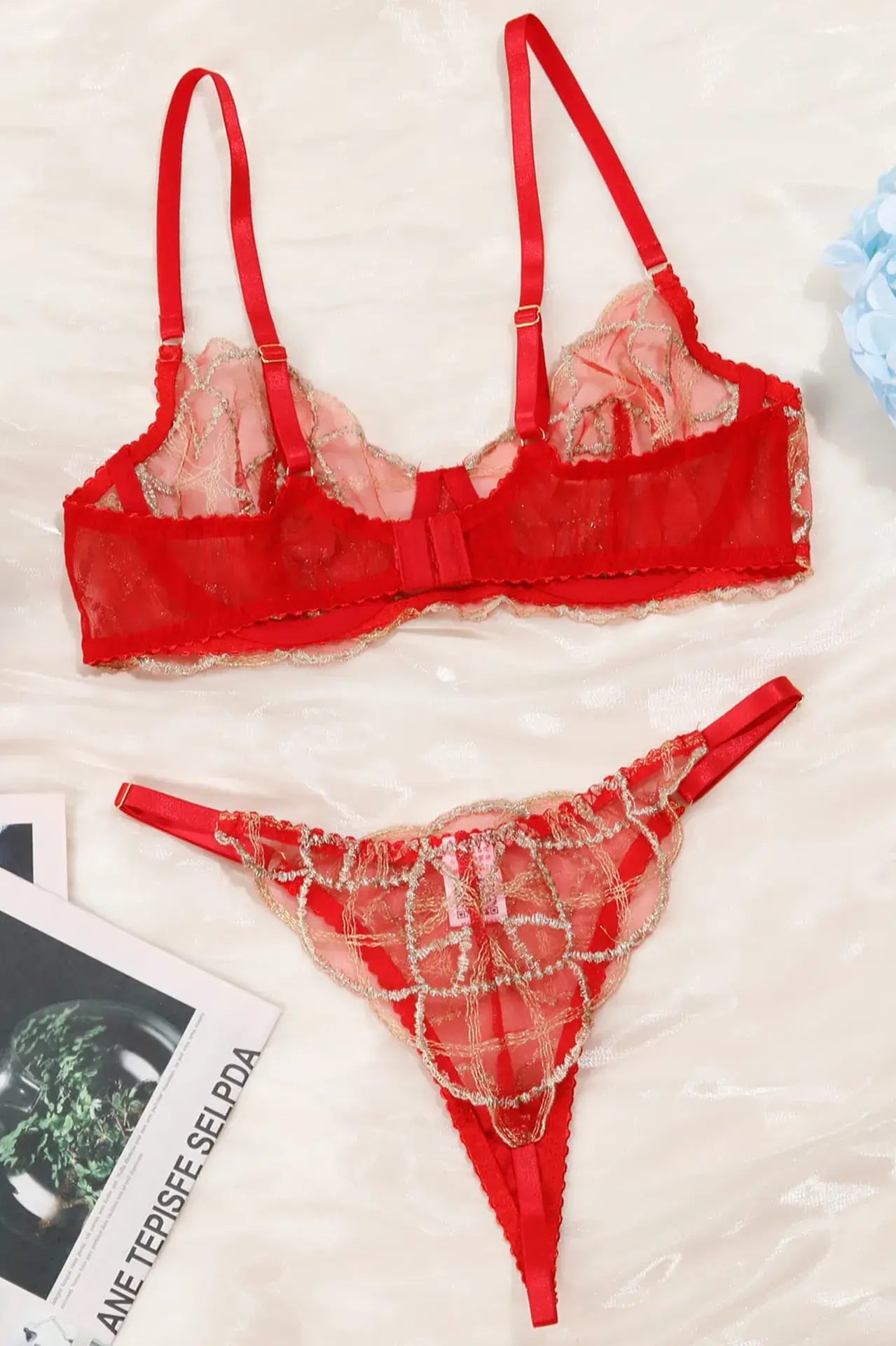 Full view of scarlet lace lingerie showing fabric distribution and balanced proportions.