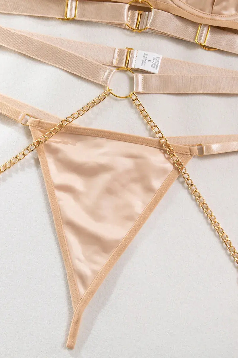 Soft-touch nude inner thong layer with breathable cotton gusset for comfort in the Velvet Armor lingerie set.