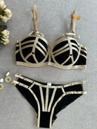 Black bra and thong set full-body view with structured design layout