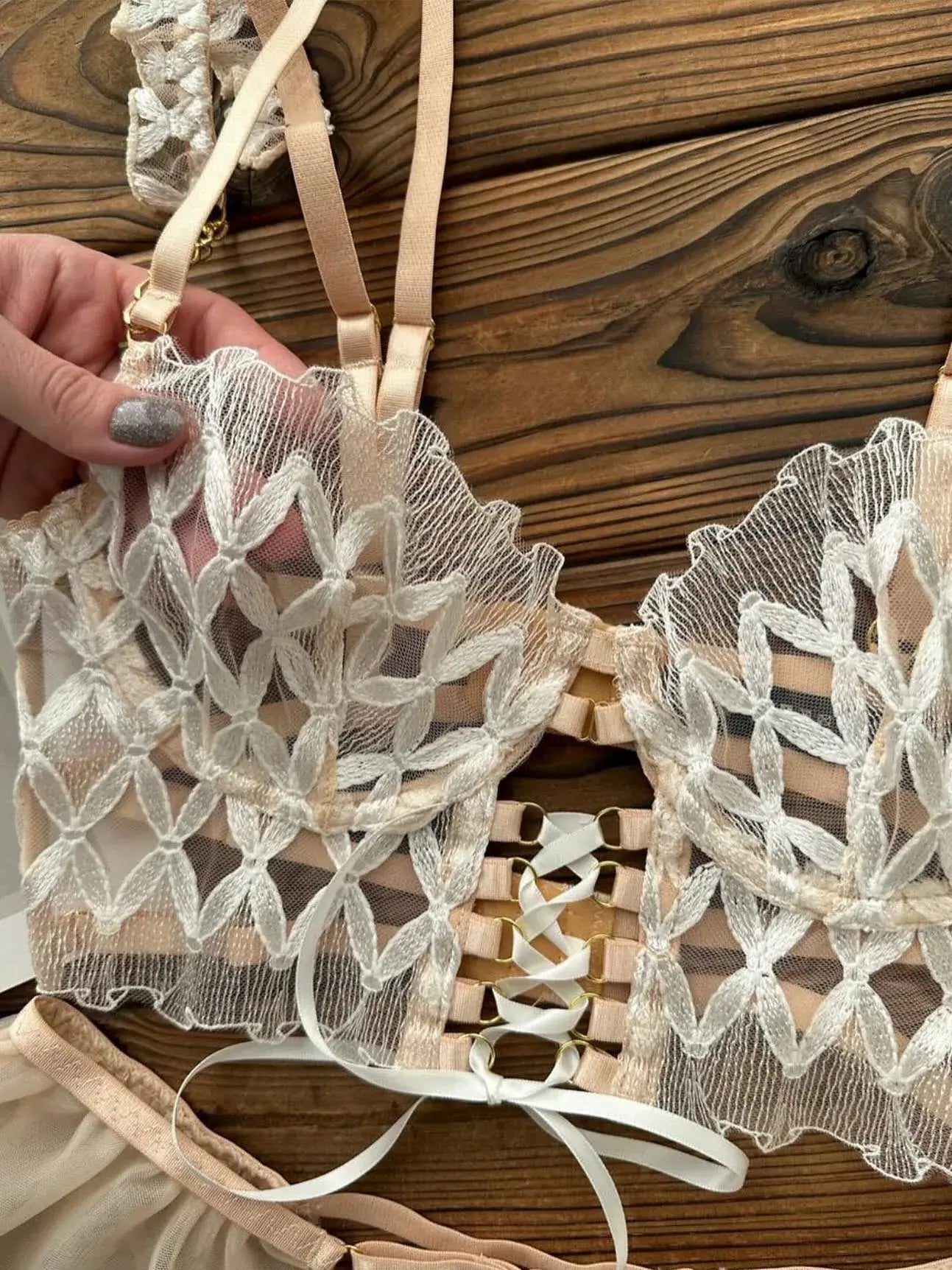 Champagne Mirage light gold lace corset close-up detail, highlighting exquisite embroidery textures.