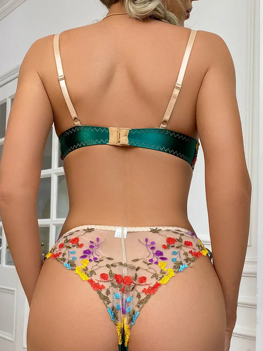 Green floral lace bra with adjustable back straps and clasp detail