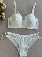 Full outline of Ivory Halo white bra and thong set with structured design