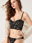 Midnight Bloom Embroidered Bustier Lingerie Set showcasing side-back design with sheer mesh and floral lace embroidery.