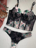 Front flat lay of Moonlight Petal lace bodysuit for women, emphasizing structured cups and floral lace design.