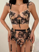Noir Eclipse 3-Piece Black Mesh Corset Lingerie Set front view showcasing waist-cinching design with sheer mesh and gold embroidery