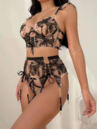 Side view of Noir Eclipse black and gold lingerie set with delicate straps and lace trim, highlighting figure-hugging silhouette