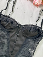 Detailed close-up of bra section on Noir Lace Bodysuit Teddy emphasizing lace craftsmanship.