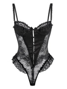 Noir Lace Bodysuit Teddy hanging on white background showing silhouette and lace detail.