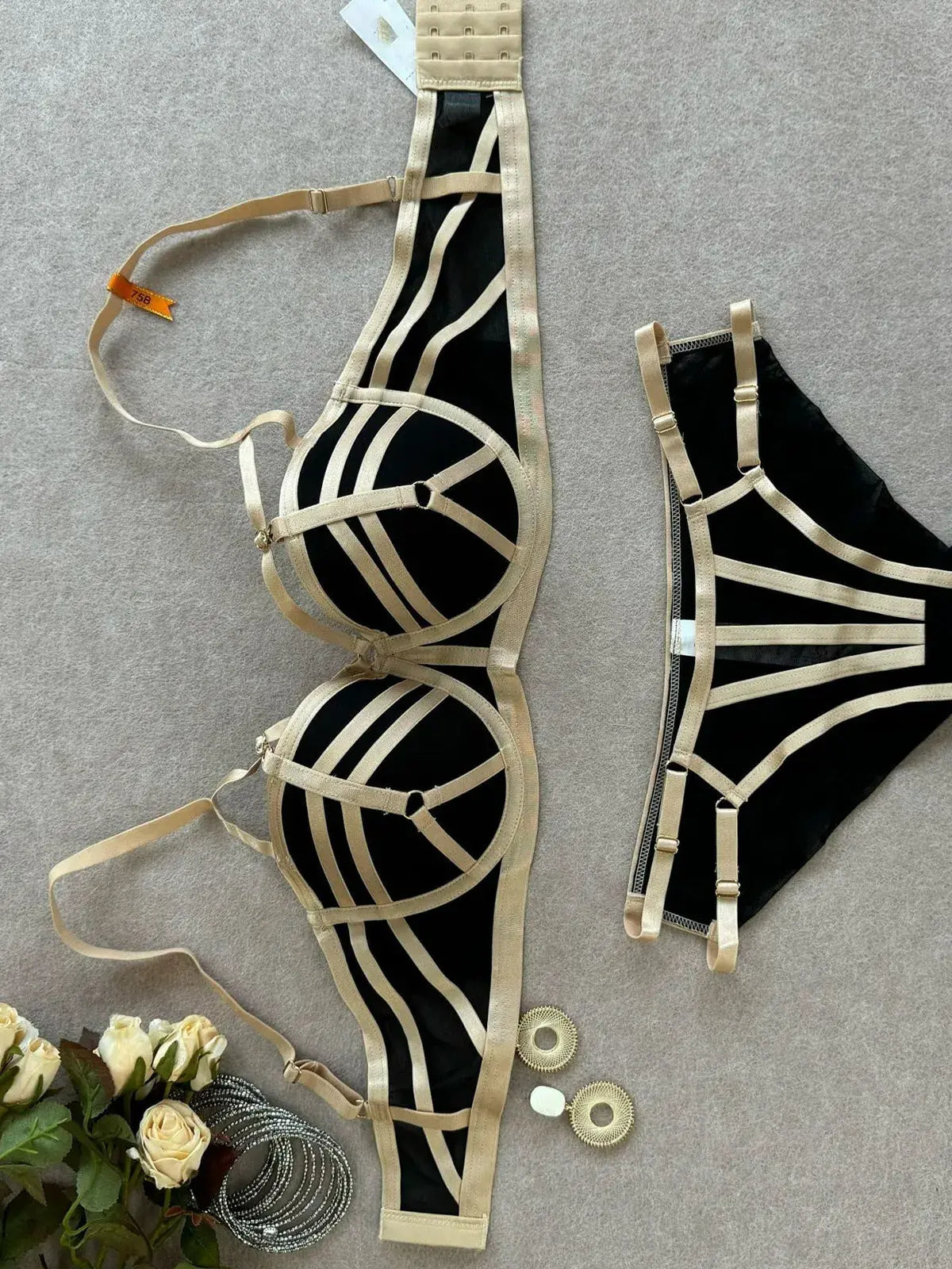 Nude strap bra laid flat showcasing refined luxury texture