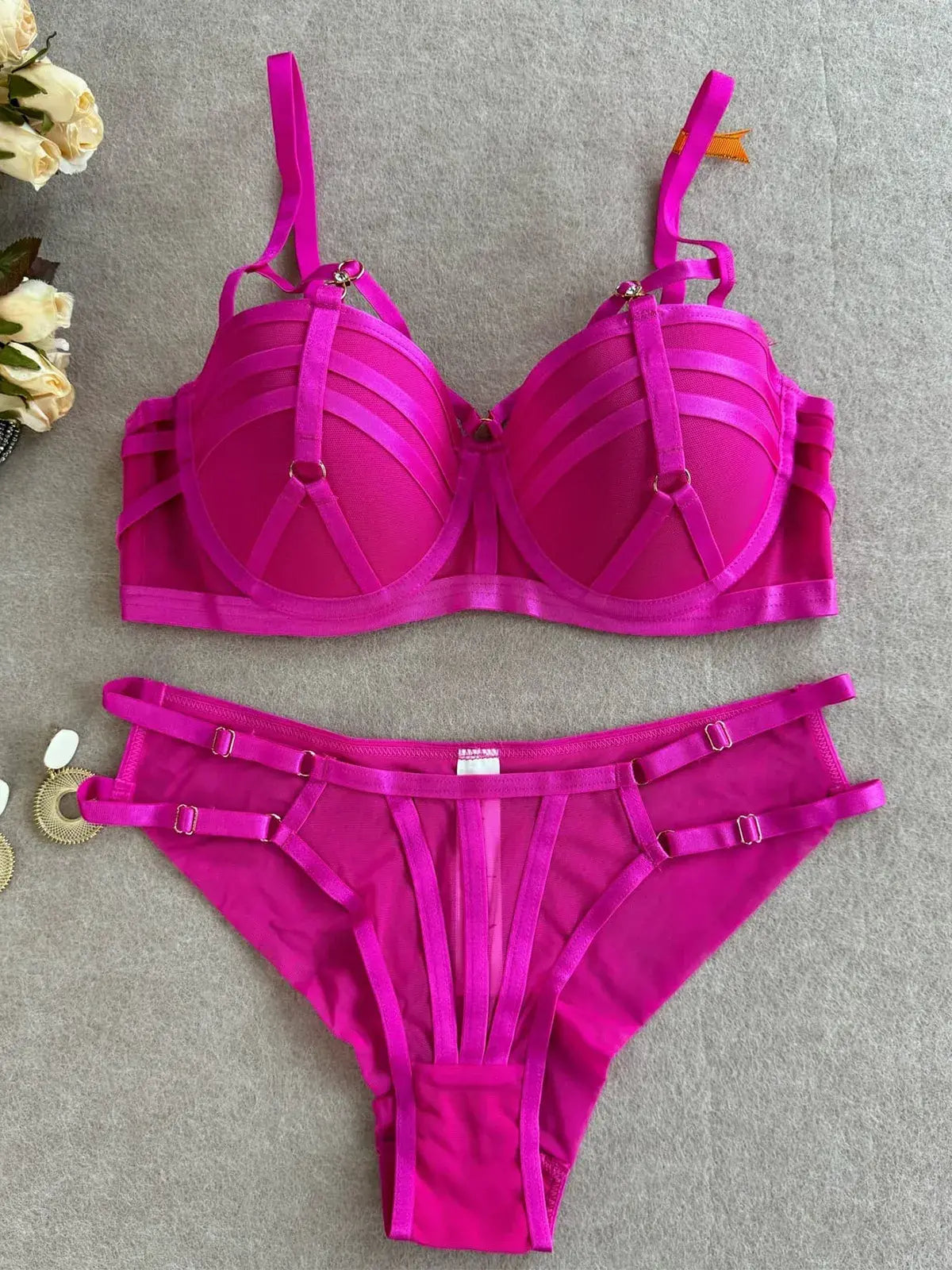 Full view of purple bra and thong lingerie set highlighting structured design