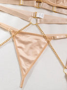 Soft-touch nude inner thong layer with breathable cotton gusset for comfort in the Velvet Armor lingerie set.