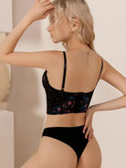 Wearable lace corset lingerie set styled as outerwear, showing elegant bustier fit.