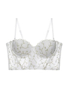 Ivory bustier top lingerie piece displayed in full view, combining sheer mesh and gold embroidery for a luxe look.