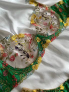 Wildflower embroidered lace bra in green sheer mesh close-up view